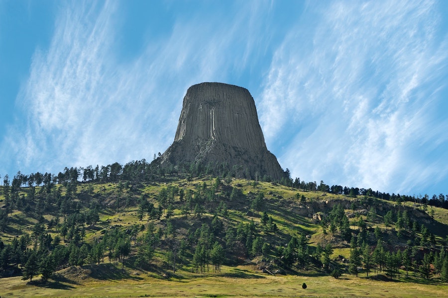 Devils Tower on a sunny day in Wyoming.
