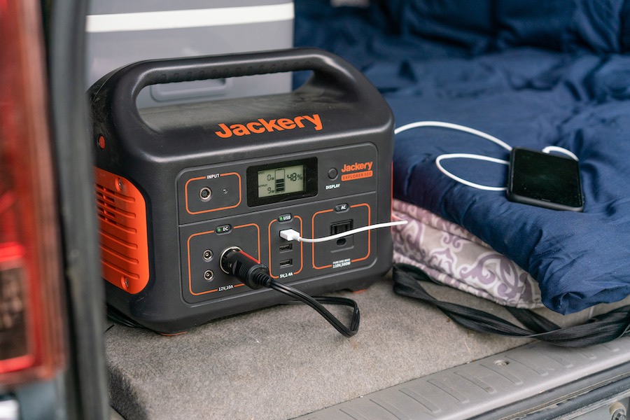 Jackery Explorer 500 charging devices in the back of a Toyota 4Runner camper