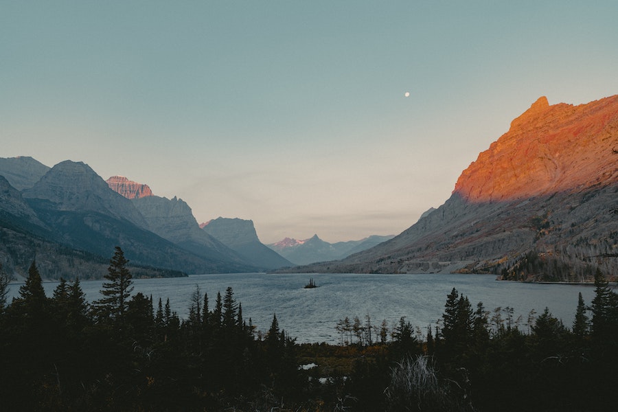 Mountains and lake at sunset in Glacier National Park in Montana.
