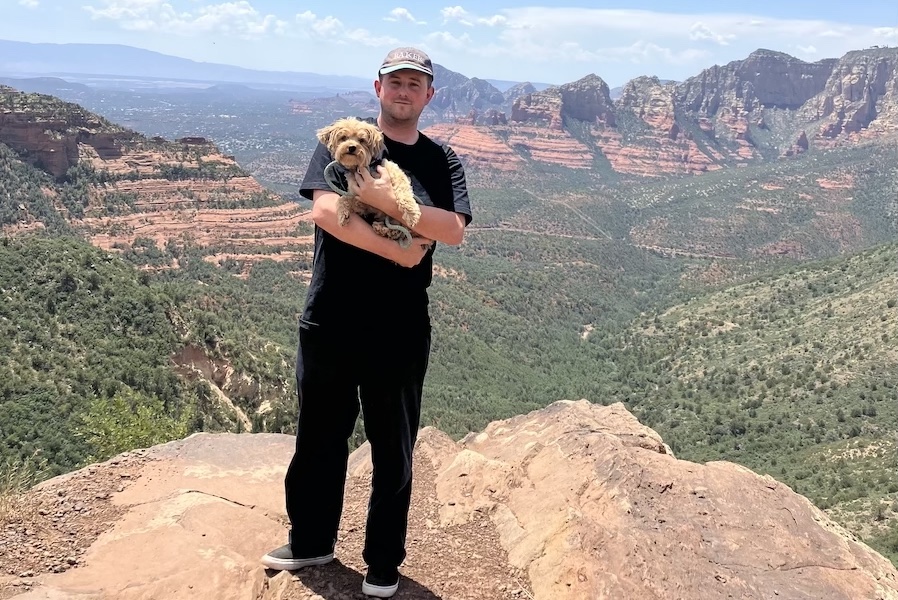 Jake, the founder of Campnado, and his dog.